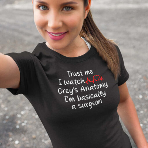 Grey's Anatomy T-shirt in Black A playful Grey's Anatomy Trust Me t-shirt with the text "Trust me, I watch grey's anatomy" prominently displayed.