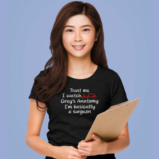 Grey's Anatomy T-shirt in Black A Grey's Anatomy Trust Me t-shirt with the text "Trust me, I watch grey's anatomy" prominently displayed.
