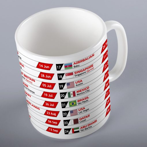 White ceramic mug featuring the 2026 Formula One race calendar with detailed Grand Prix schedule printed in bold red, black, and white; includes flags, country names, city venues, and race dates from the 2026 f1 season, making it a must-have F1 fan collectible or gift for motorsport enthusiasts.