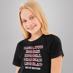 Smiling child wearing a black kids Formula One T-shirt with a Union Jack-style design listing Hamilton, Norris, Russell, Bearman and Lindblad, with “Best of British” printed below.