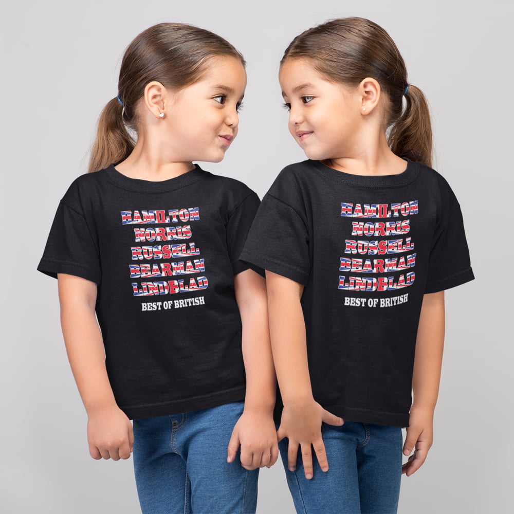 Two children wearing black kids Formula One T-shirts with a Union Jack-style text design featuring Hamilton, Norris, Russell, Bearman and Lindblad, with “Best of British” printed underneath.